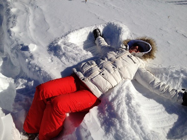 Lori making snow angel
