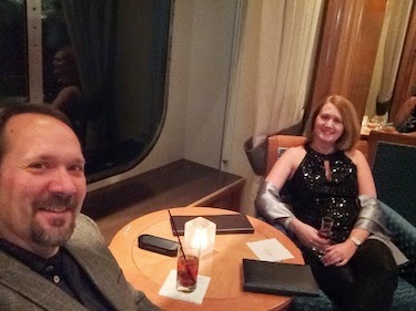 Chuck and Lori's Travel Blog - Chuck and Lori in the Chart Room Lounge on the Queen Mary 2