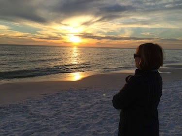 Chuck and Lori's Travel Blog - Lori on Beach at Sunset