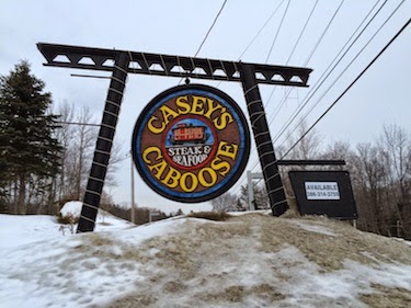 Chuck and Lori's Travel Blog - Casey's Caboose Sign, with 