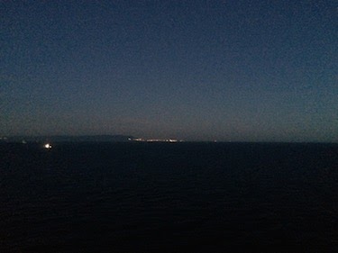 Chuck and Lori's Travel Blog - Coast of Africa at Night from Norwegian Epic