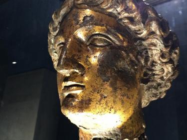 Gold bust of Sulis-Minerva, Roman Baths at Bath, UK